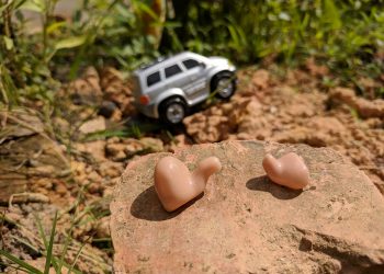 Hearing aids with the jeep as adventure background